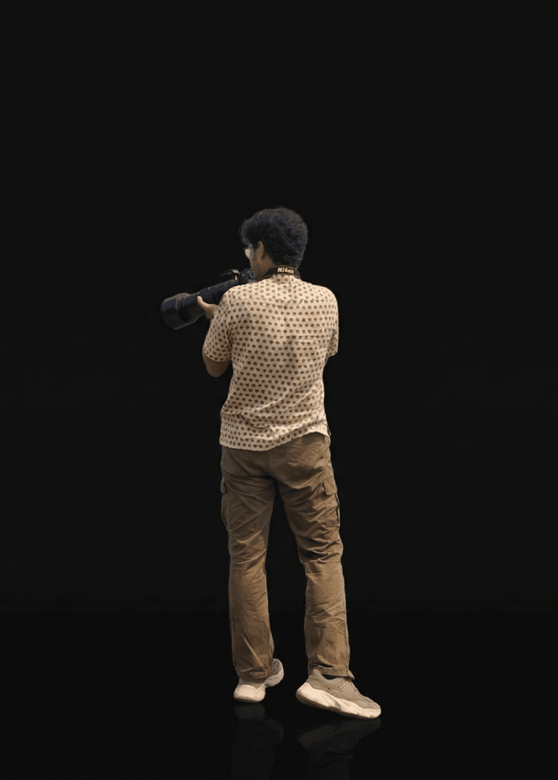 Photographer holding a camera